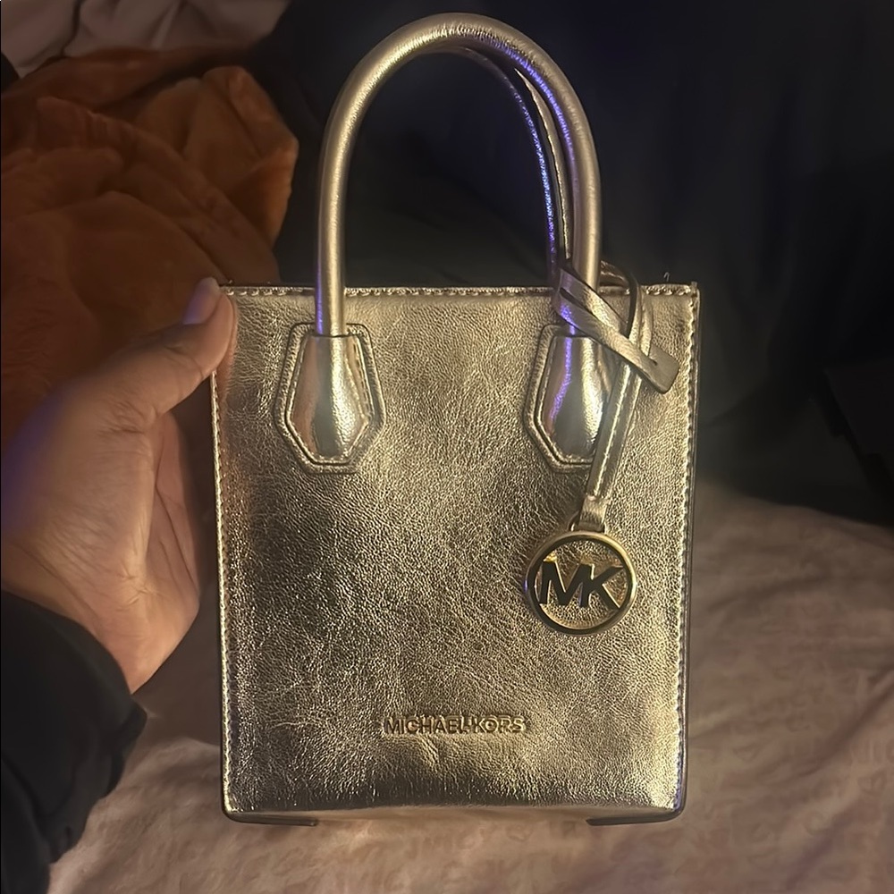 Michael Kors Mercer Extra-Small Pebbled
Leather Crossbody Bag